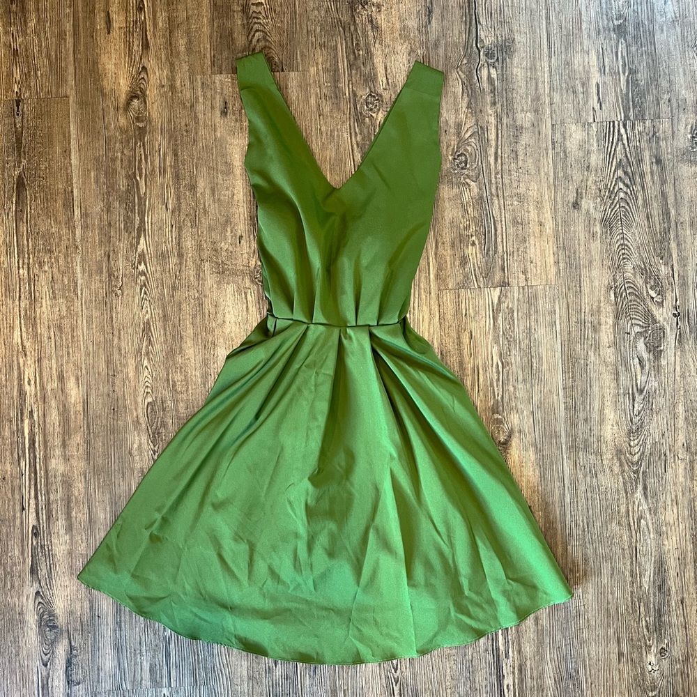 Green mini open back dress
